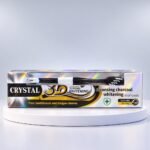 Crystal3D Cleansing charcoal whitening toothpaste on a white display stand